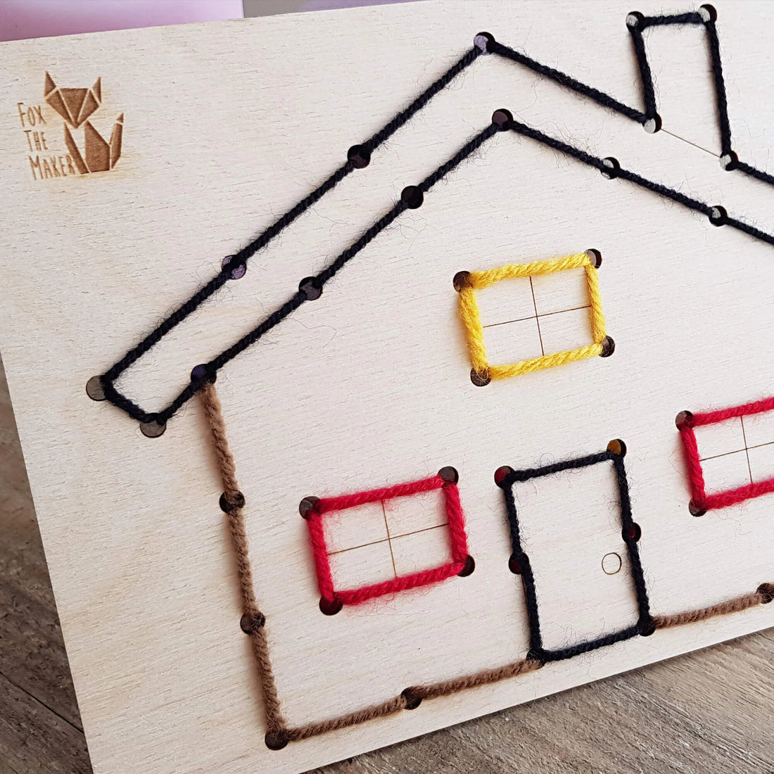 Wooden Sewing Kit with a Plastic Needle