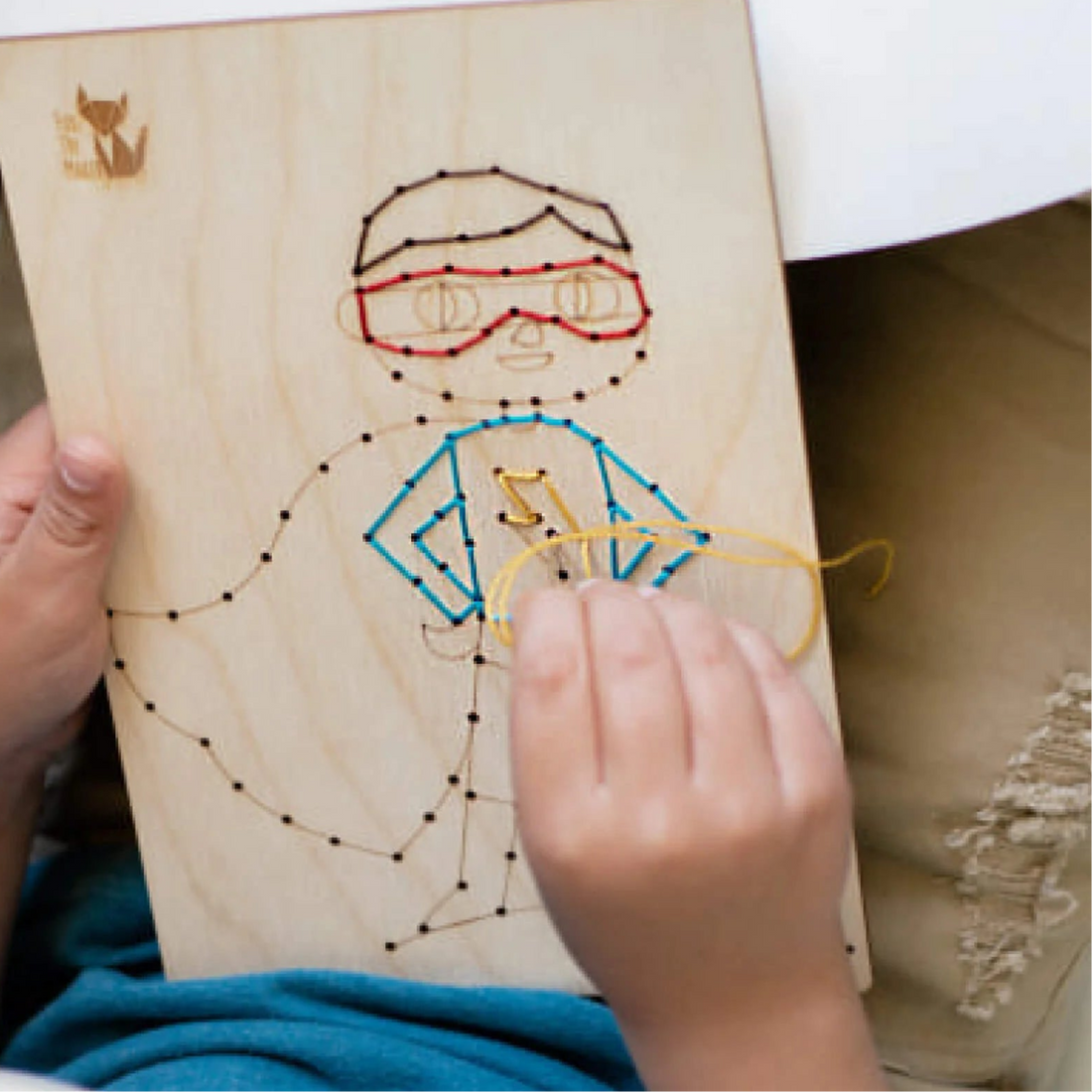 Wooden Sewing Kit with a Metallic Needle