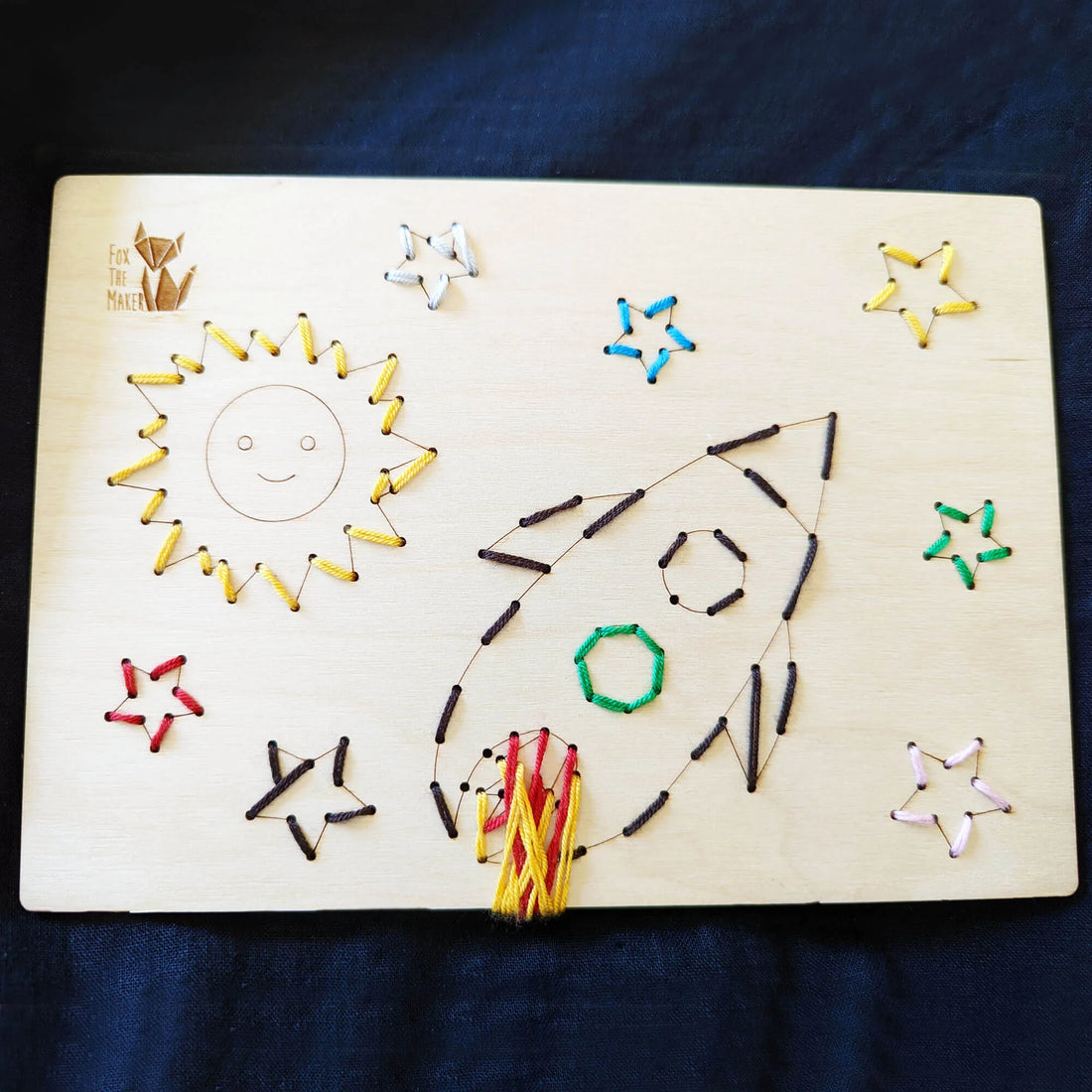Wooden Sewing Kit with a Metallic Needle