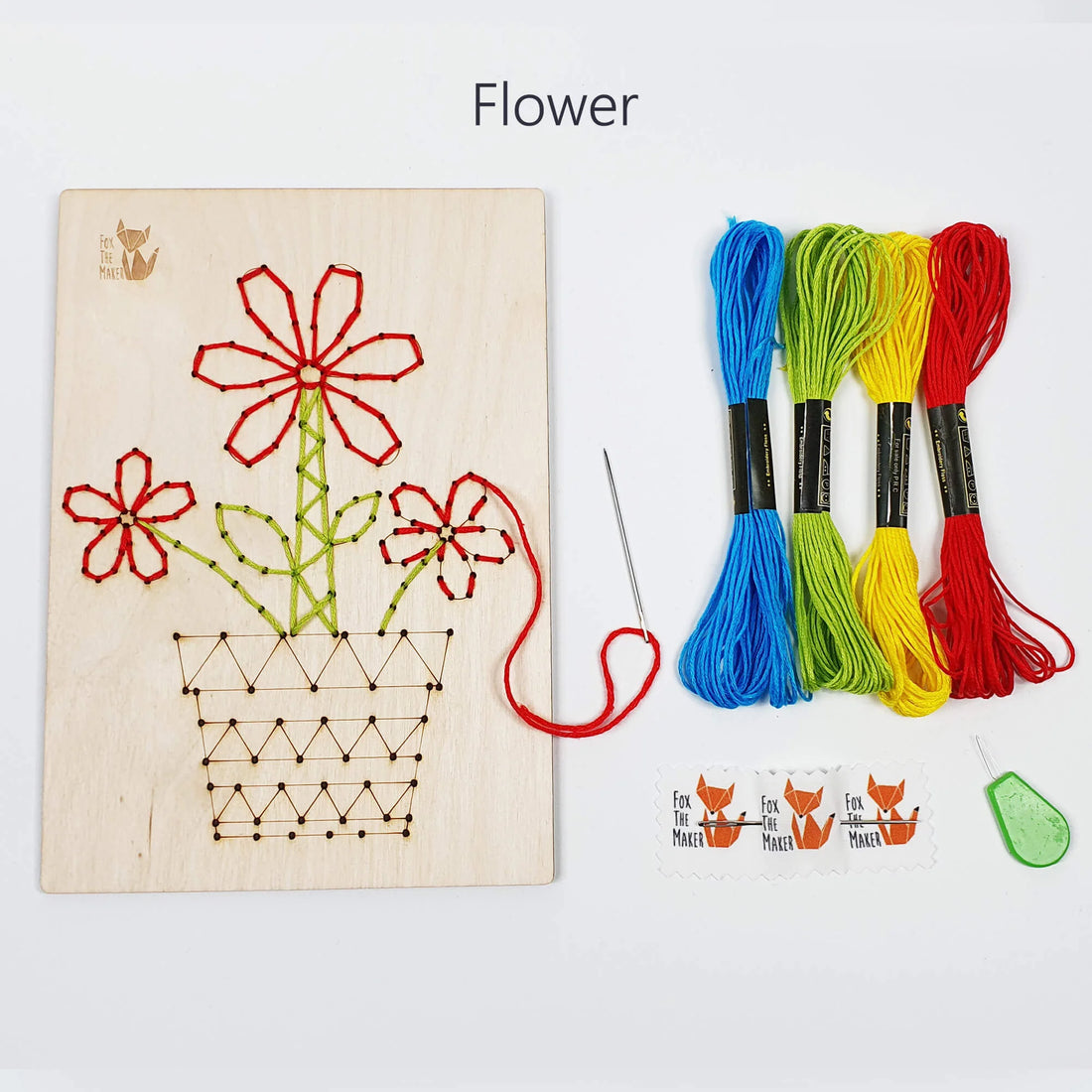 Wooden Sewing Kit with a Metallic Needle