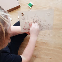 Julsyset med metallnål